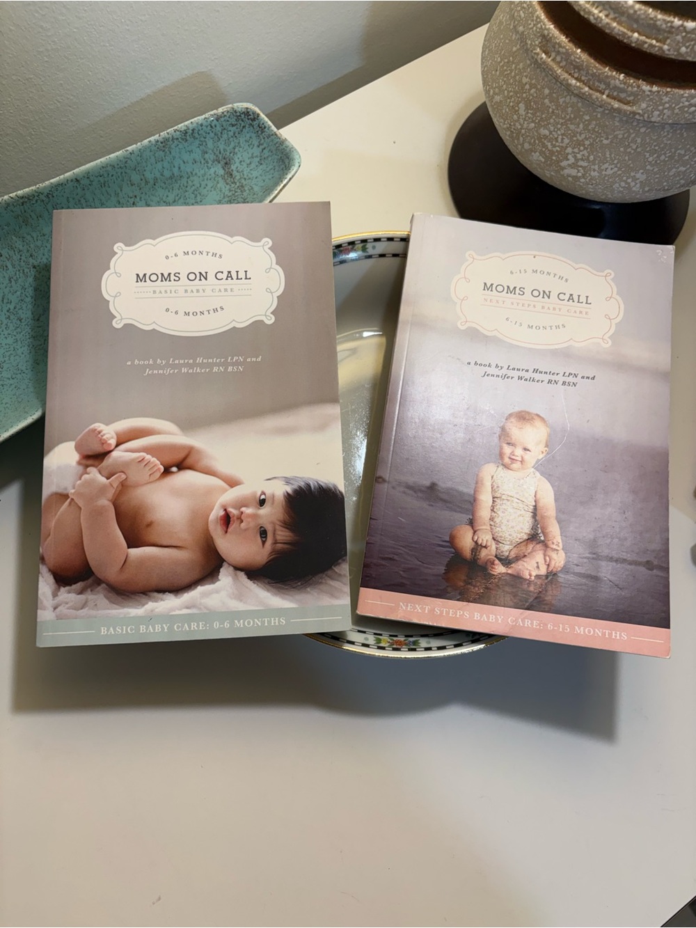 Moms on Call Baby Care Book Set - Gray and Pink Covers